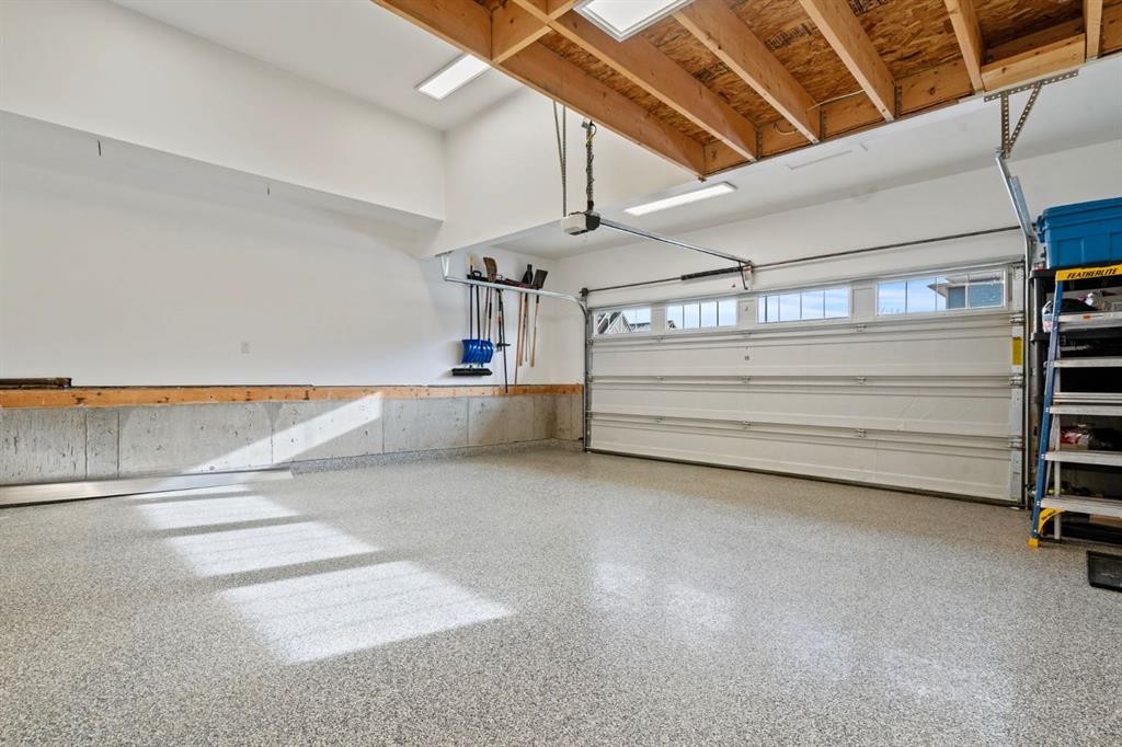 85 Mount Rae Heights, Okotoks, AB - Indoor Photo Showing Garage