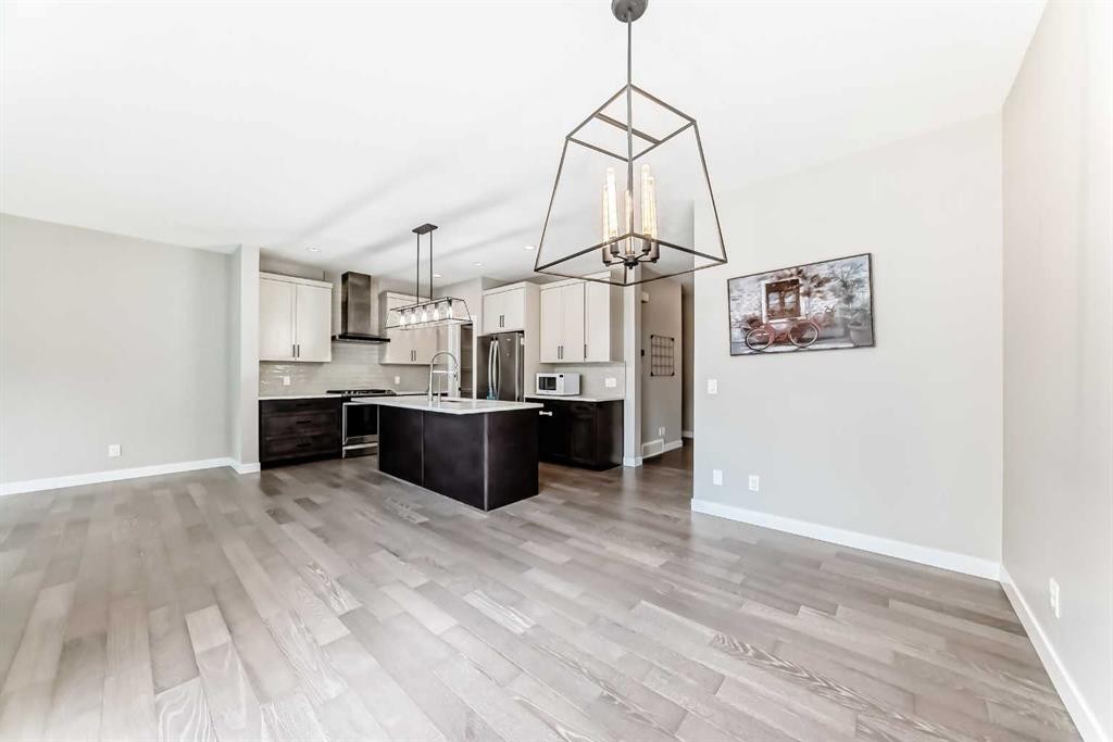 41 Shawnee Green Sw, Calgary, AB - Indoor Photo Showing Kitchen