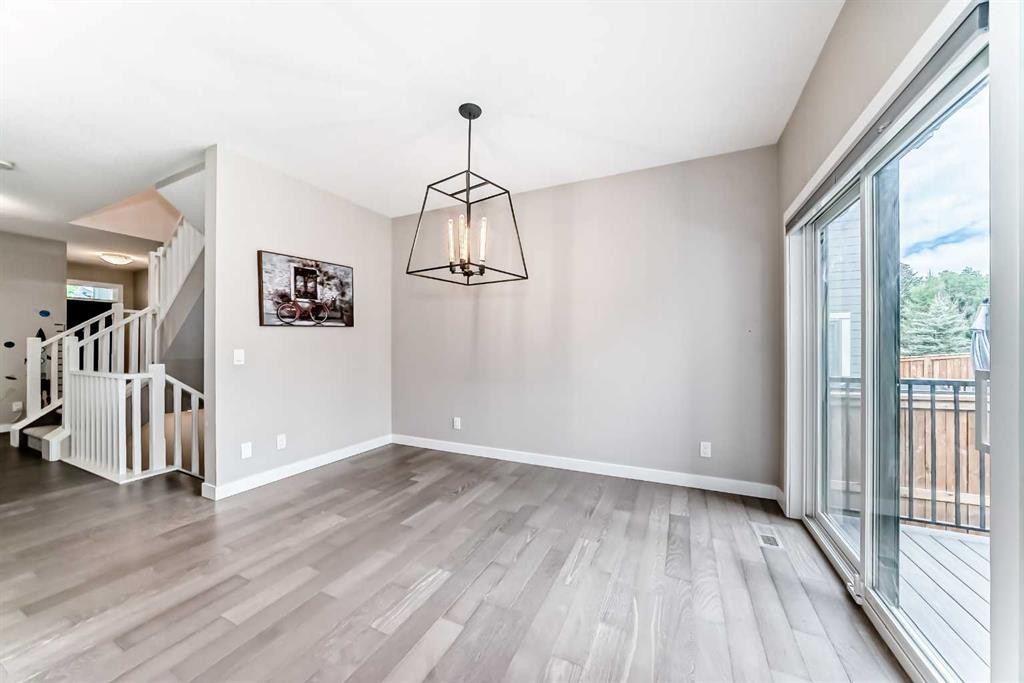 41 Shawnee Green Sw, Calgary, AB - Indoor Photo Showing Other Room