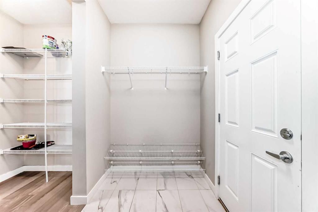 41 Shawnee Green Sw, Calgary, AB - Indoor With Storage