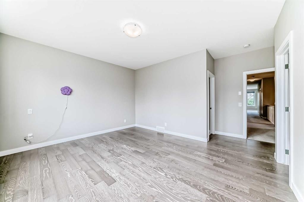 41 Shawnee Green Sw, Calgary, AB - Indoor Photo Showing Other Room