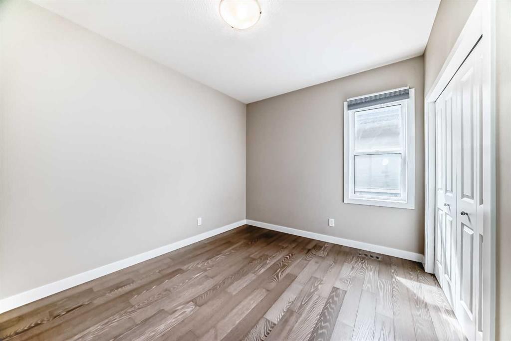 41 Shawnee Green Sw, Calgary, AB - Indoor Photo Showing Other Room