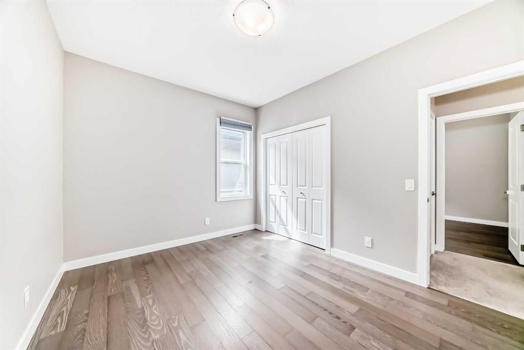 41 Shawnee Green Sw, Calgary, AB - Indoor Photo Showing Other Room