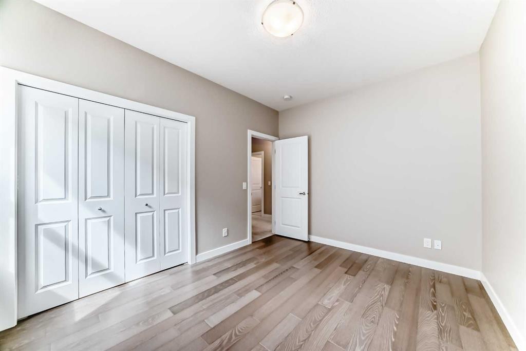 41 Shawnee Green Sw, Calgary, AB - Indoor Photo Showing Other Room