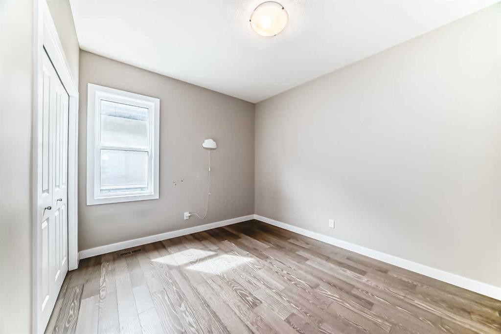 41 Shawnee Green Sw, Calgary, AB - Indoor Photo Showing Other Room