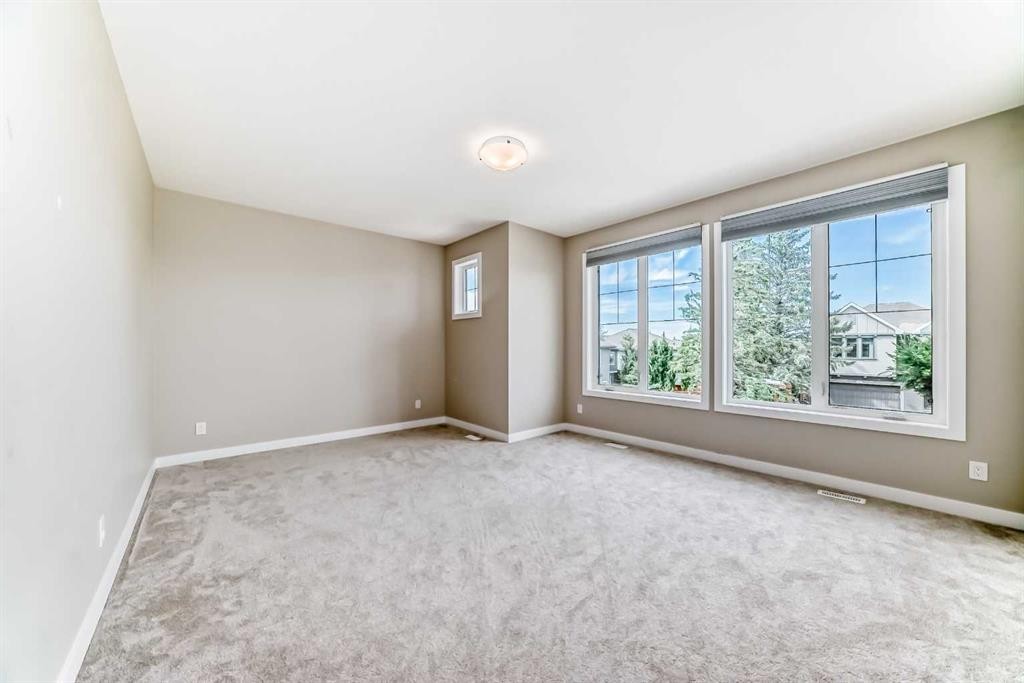 41 Shawnee Green Sw, Calgary, AB - Indoor Photo Showing Other Room