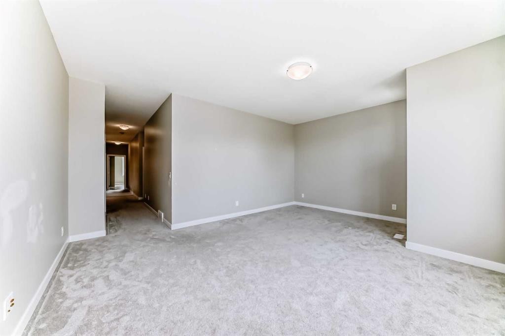41 Shawnee Green Sw, Calgary, AB - Indoor Photo Showing Other Room