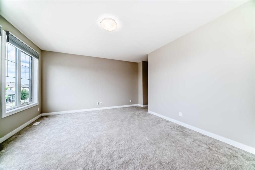 41 Shawnee Green Sw, Calgary, AB - Indoor Photo Showing Other Room