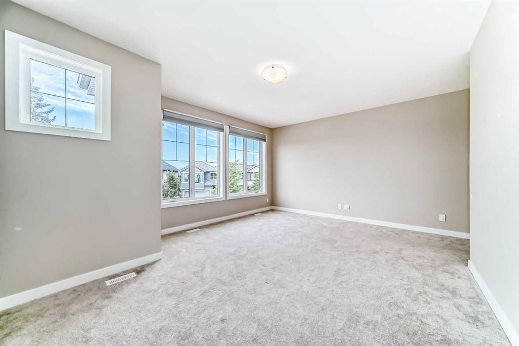 41 Shawnee Green Sw, Calgary, AB - Indoor Photo Showing Other Room