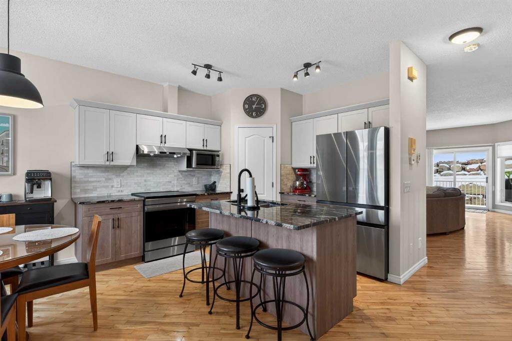 42 Hamptons Link Nw, Calgary, AB - Indoor Photo Showing Kitchen With Stainless Steel Kitchen With Upgraded Kitchen