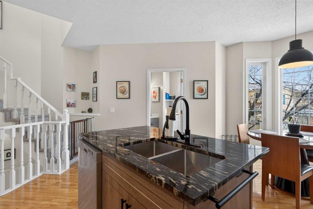 42 Hamptons Link Nw, Calgary, AB - Indoor Photo Showing Kitchen With Double Sink