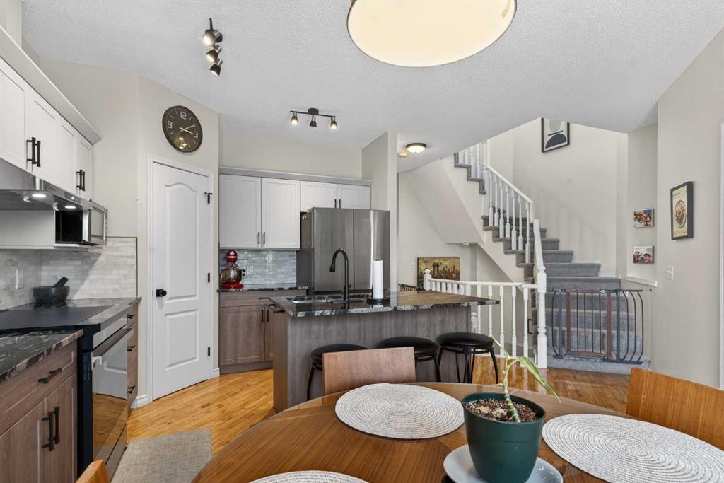 42 Hamptons Link Nw, Calgary, AB - Indoor Photo Showing Kitchen With Upgraded Kitchen