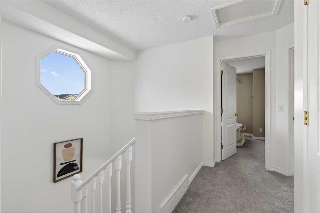 42 Hamptons Link Nw, Calgary, AB - Indoor Photo Showing Other Room