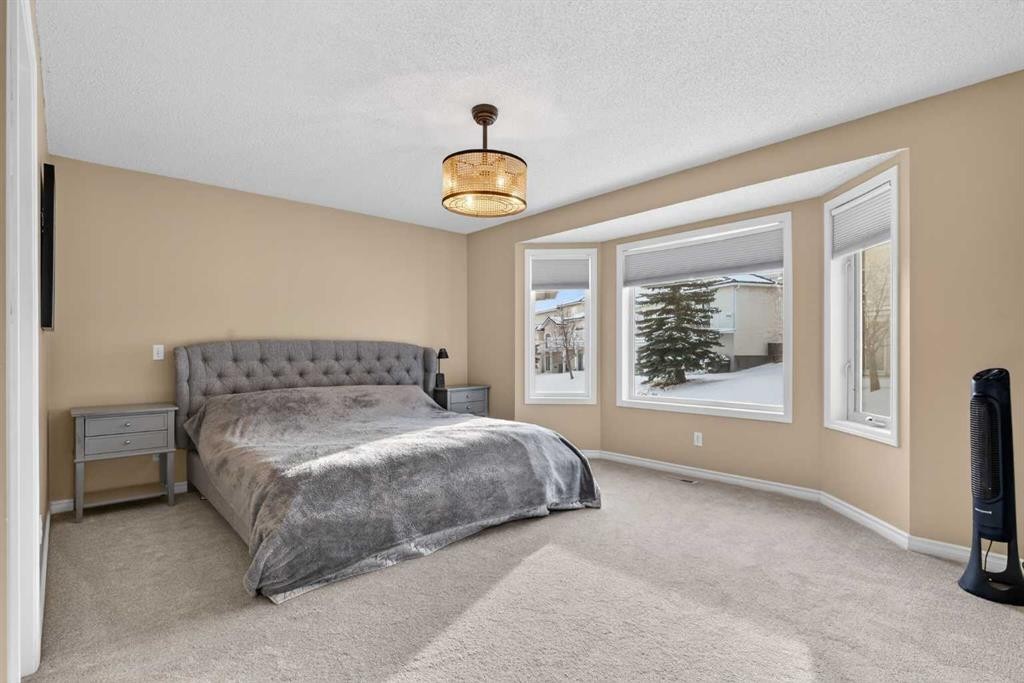 42 Hamptons Link Nw, Calgary, AB - Indoor Photo Showing Bedroom