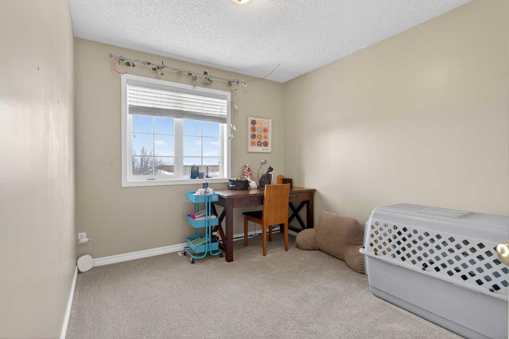 42 Hamptons Link Nw, Calgary, AB - Indoor Photo Showing Bedroom