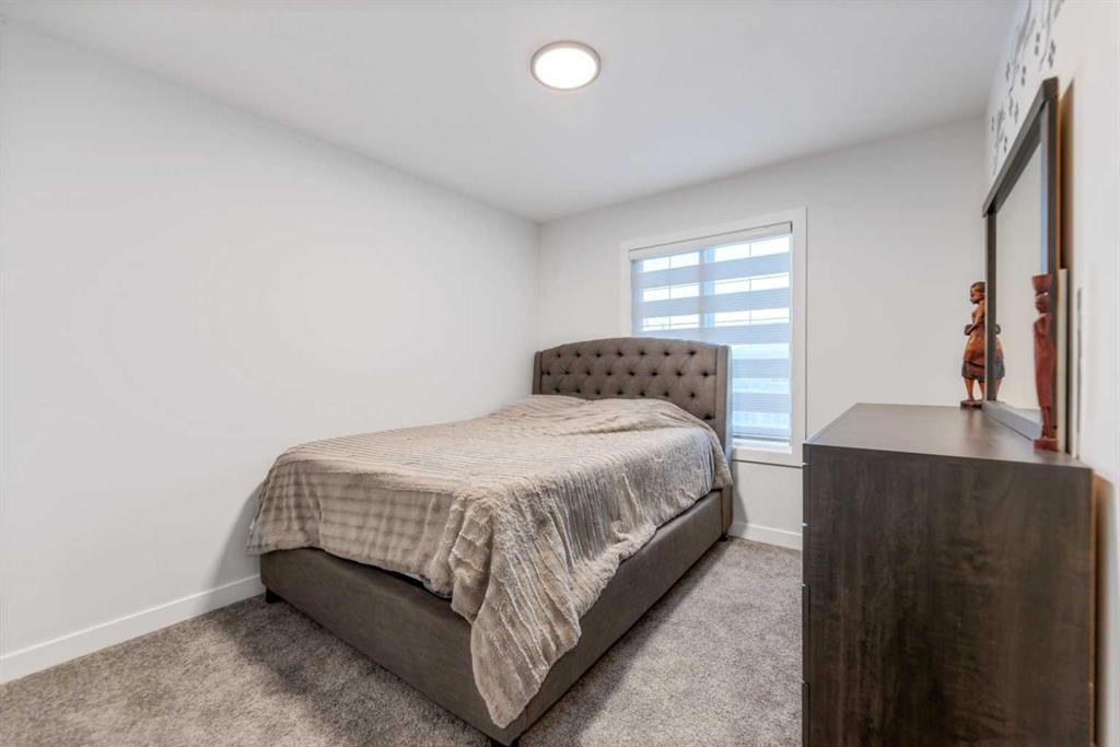 208 Dawson Circle, Chestermere, AB - Indoor Photo Showing Bedroom
