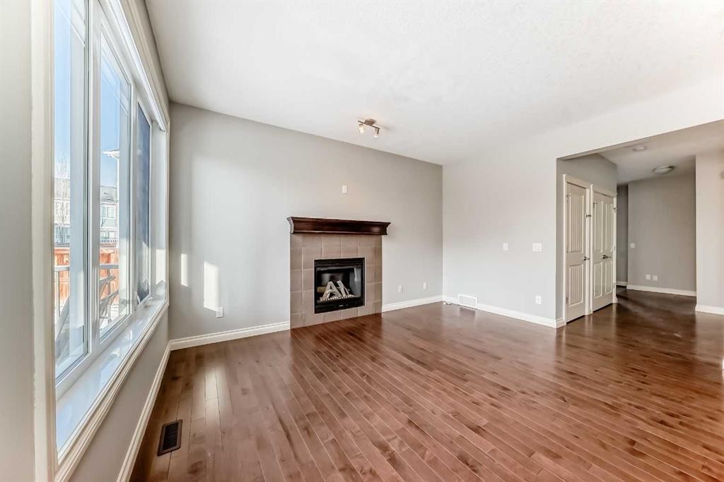 58 Sherwood Street Nw, Calgary, AB - Indoor Photo Showing Living Room With Fireplace
