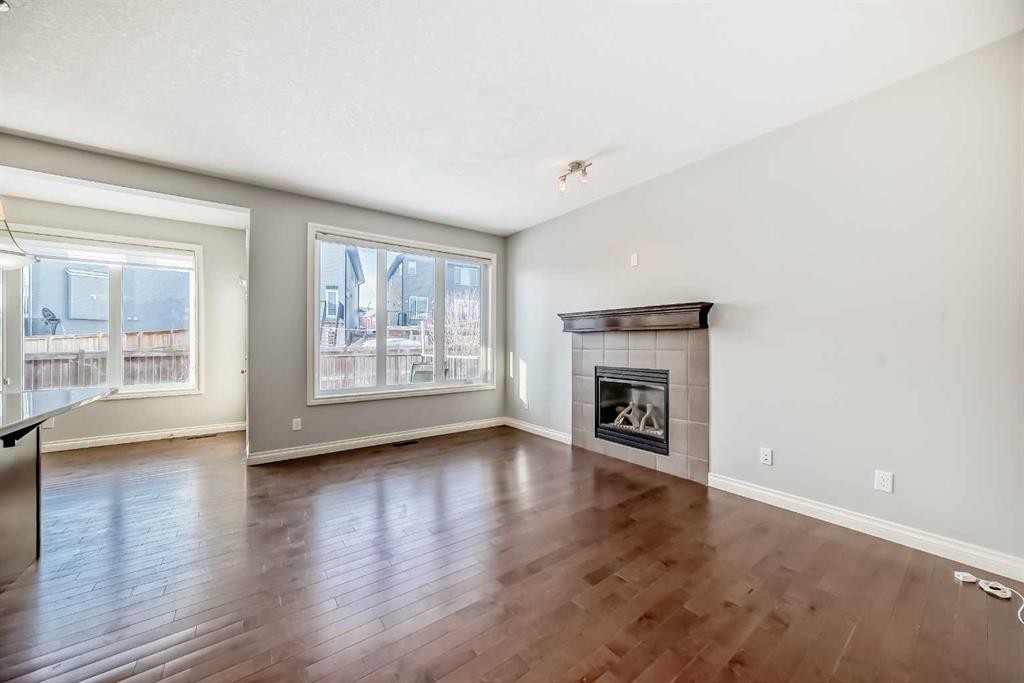 58 Sherwood Street Nw, Calgary, AB - Indoor Photo Showing Living Room With Fireplace