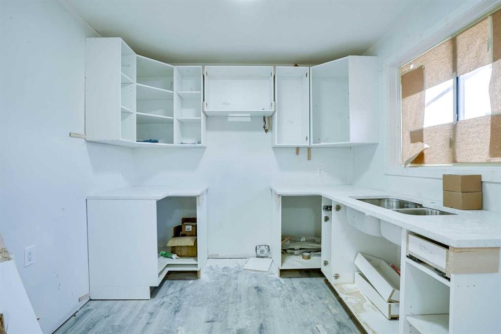 94 Martindale Boulevard Ne, Calgary, AB - Indoor Photo Showing Kitchen With Double Sink