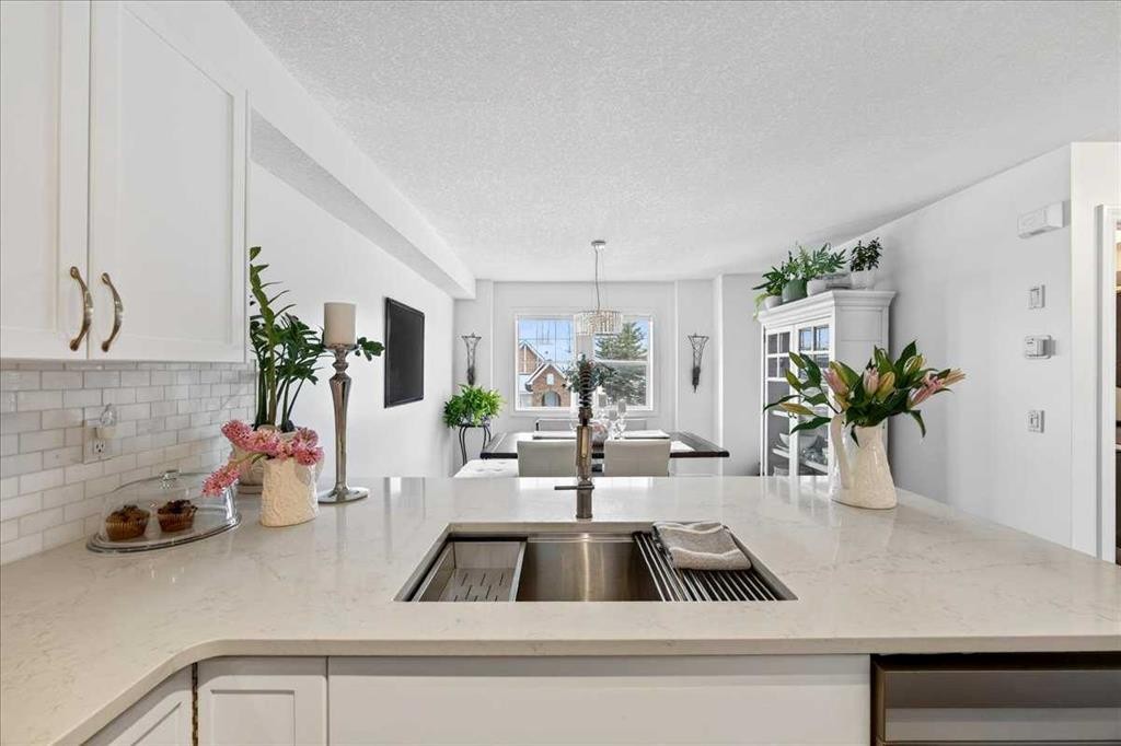 3 Tucker Circle, Okotoks, AB - Indoor Photo Showing Kitchen With Double Sink