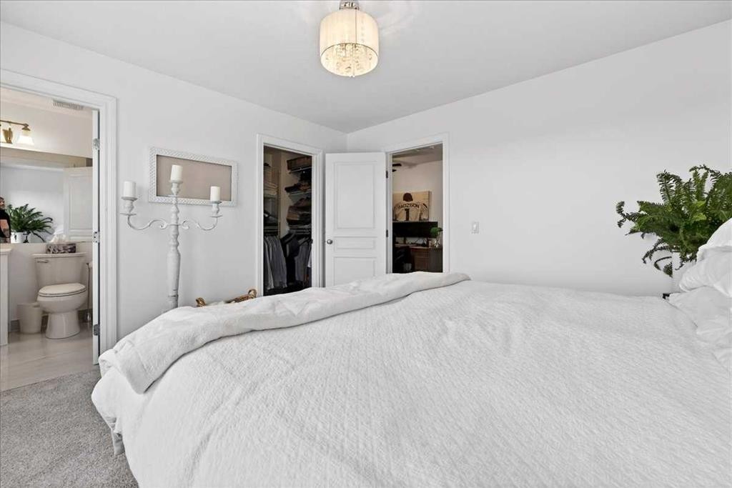 3 Tucker Circle, Okotoks, AB - Indoor Photo Showing Bedroom