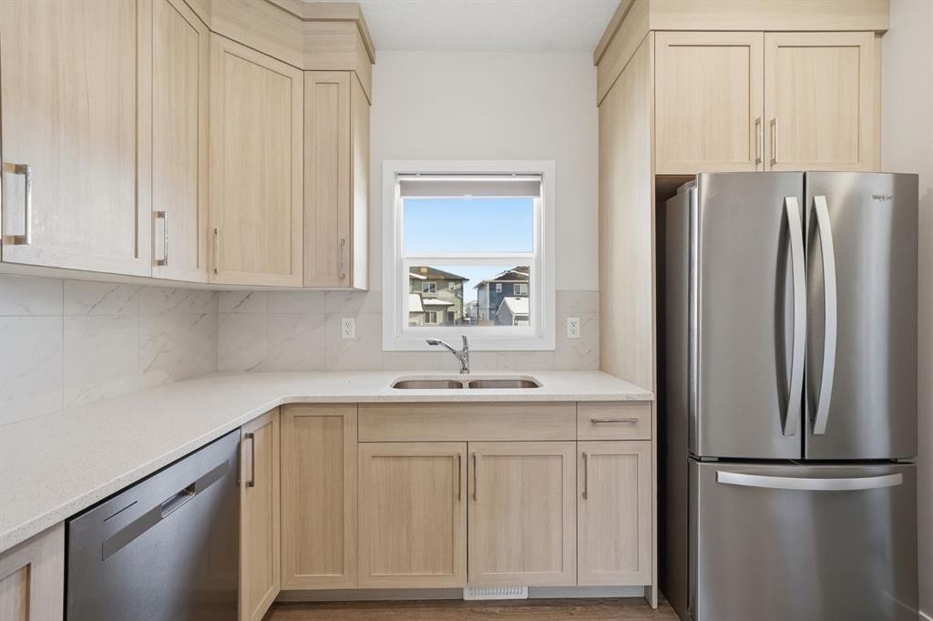 292 Cornerbrook Drive Ne, Calgary, AB - Indoor Photo Showing Kitchen With Double Sink