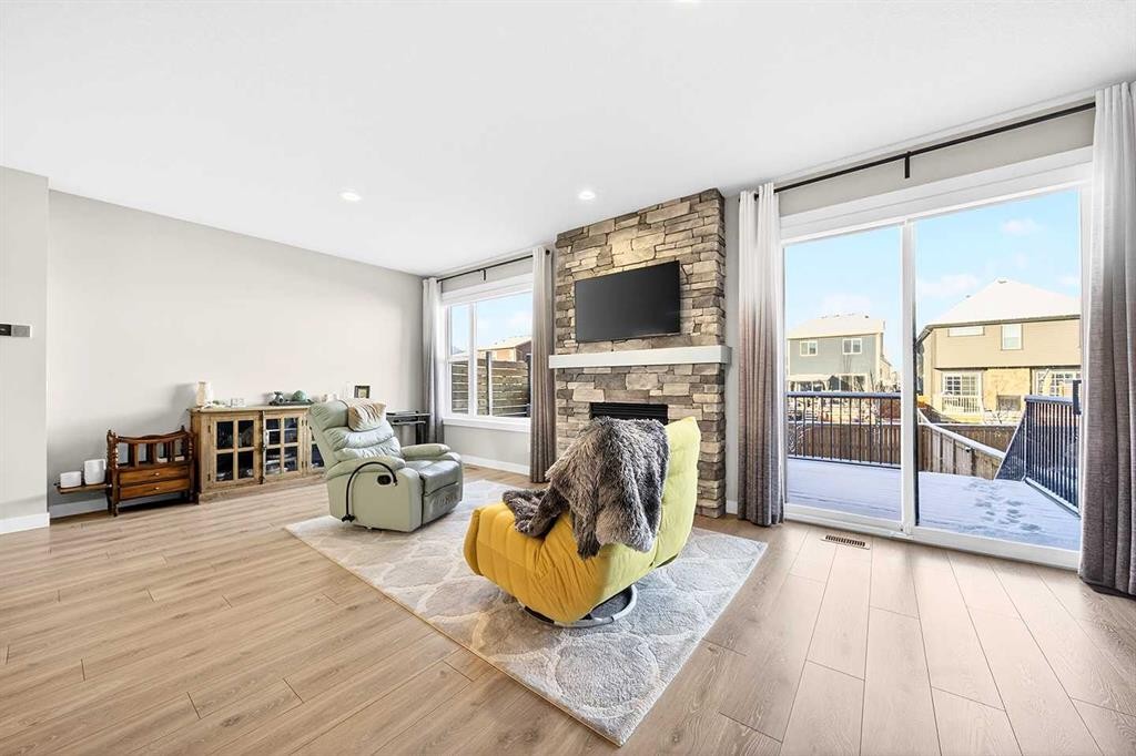 13 Cranbrook Close Se, Calgary, AB - Indoor Photo Showing Living Room With Fireplace
