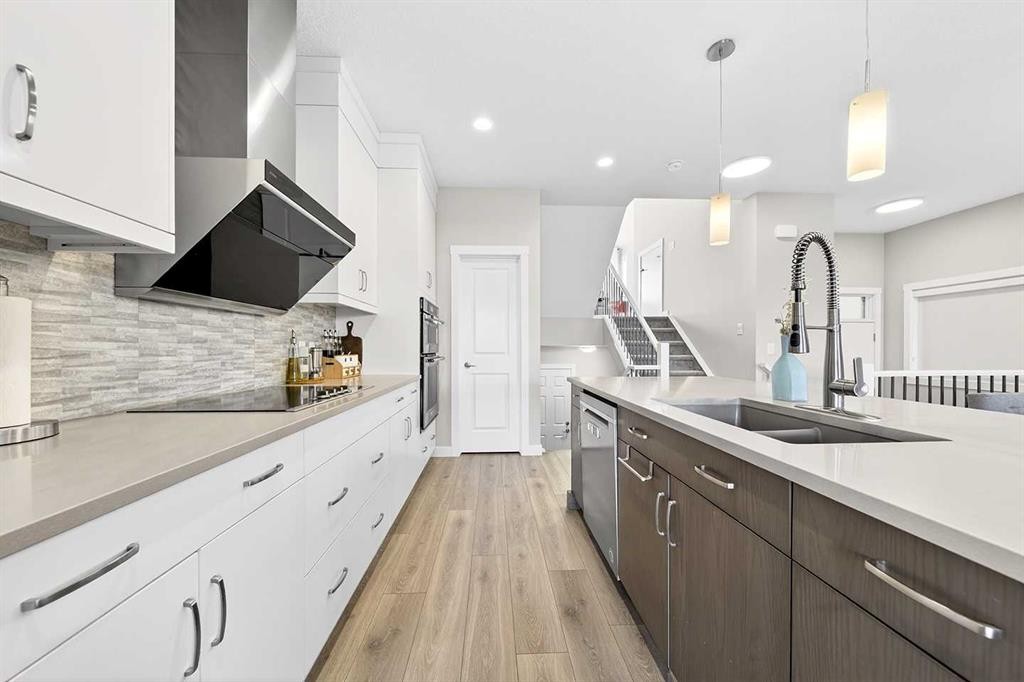 13 Cranbrook Close Se, Calgary, AB - Indoor Photo Showing Kitchen With Double Sink With Upgraded Kitchen