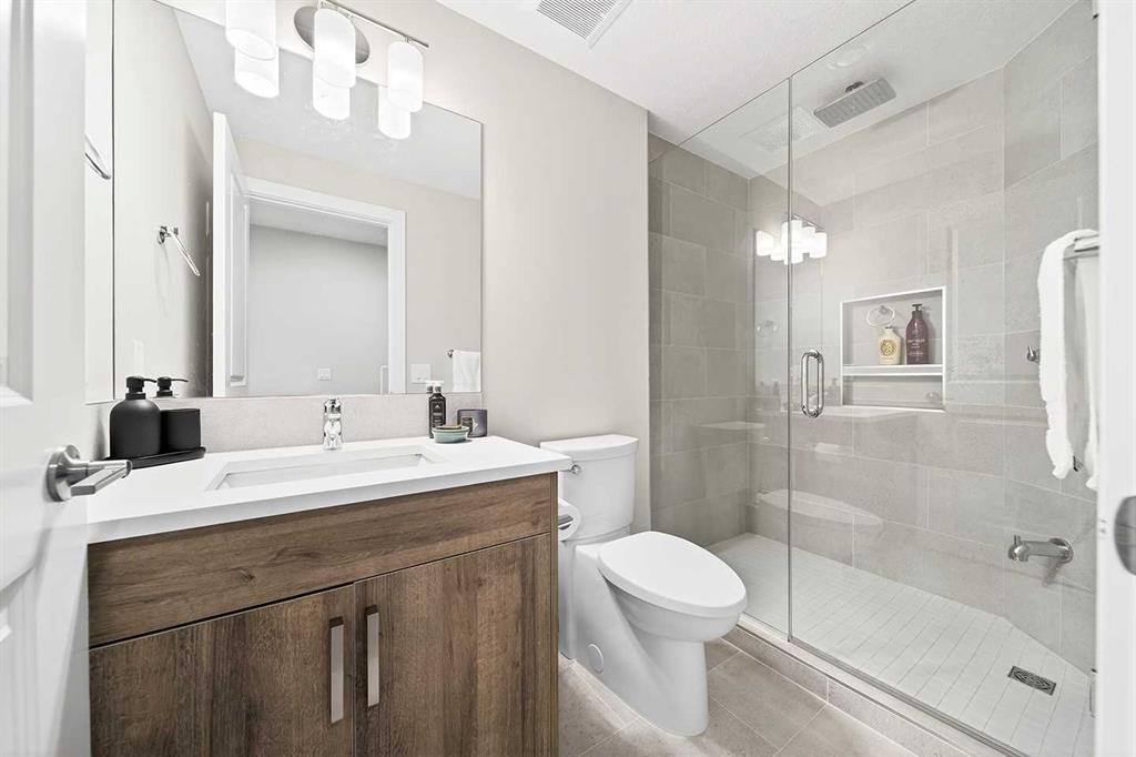 13 Cranbrook Close Se, Calgary, AB - Indoor Photo Showing Bathroom
