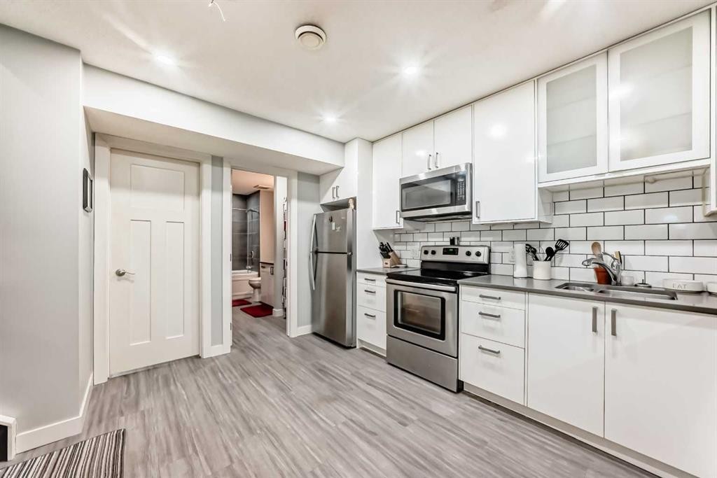 366 Auburn Bay Avenue Se, Calgary, AB - Indoor Photo Showing Kitchen With Double Sink