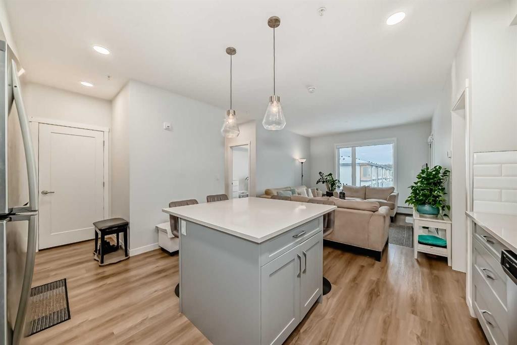 316-200 Shawnee Square Sw, Calgary, AB - Indoor Photo Showing Kitchen With Upgraded Kitchen
