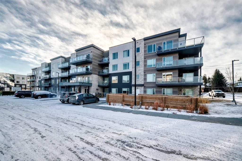 316-200 Shawnee Square Sw, Calgary, AB - Outdoor With Balcony With Facade