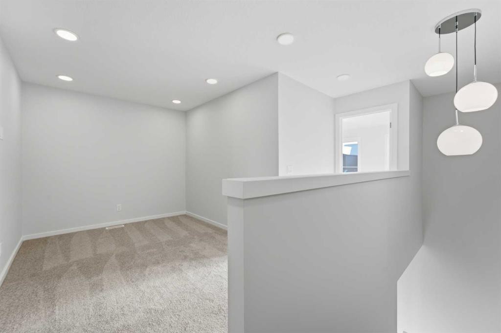 8 Heartwood Lane Se, Calgary, AB - Indoor Photo Showing Other Room