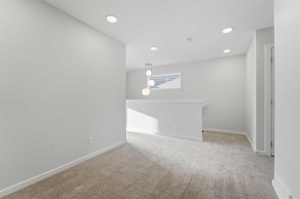 8 Heartwood Lane Se, Calgary, AB - Indoor Photo Showing Other Room