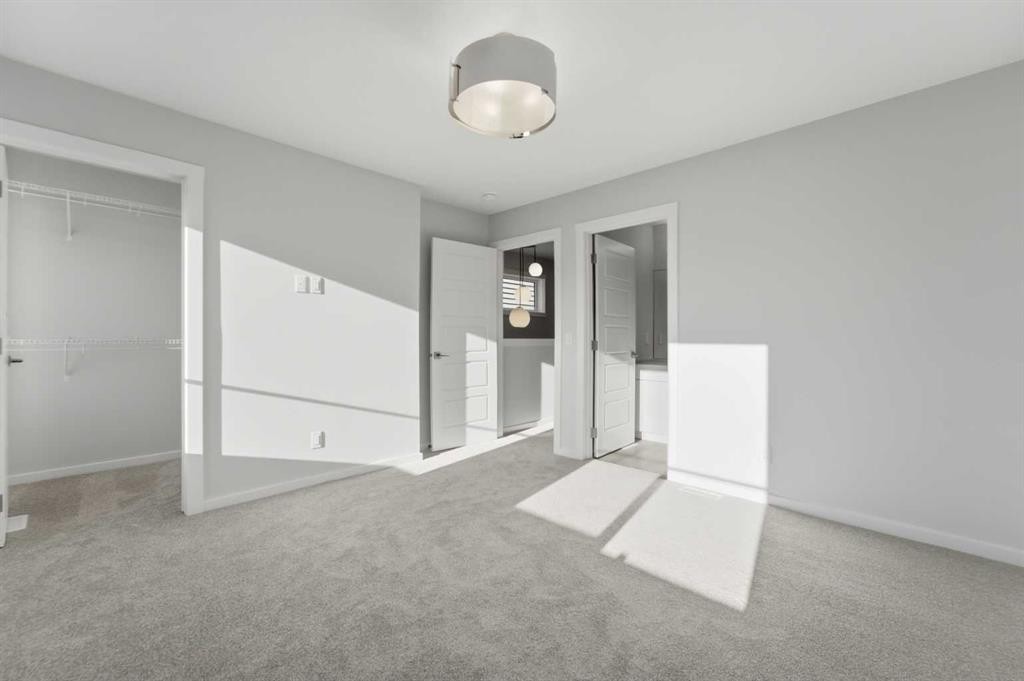 8 Heartwood Lane Se, Calgary, AB - Indoor Photo Showing Other Room