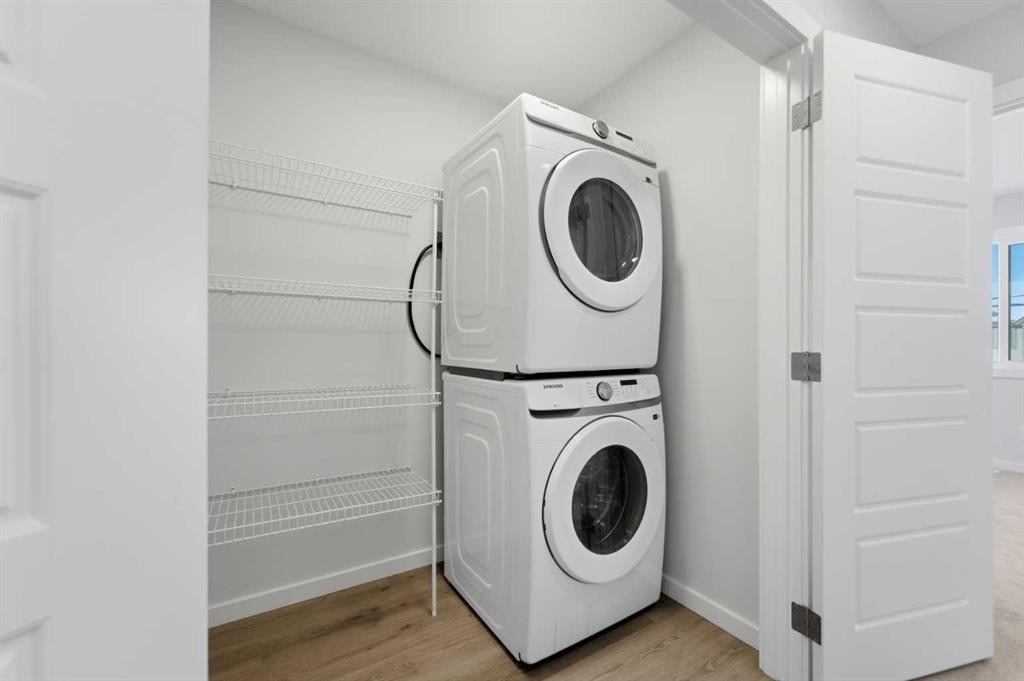 8 Heartwood Lane Se, Calgary, AB - Indoor Photo Showing Laundry Room