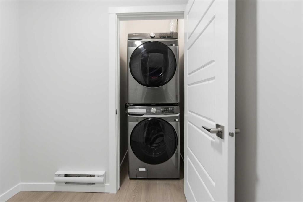 8 Heartwood Lane Se, Calgary, AB - Indoor Photo Showing Laundry Room