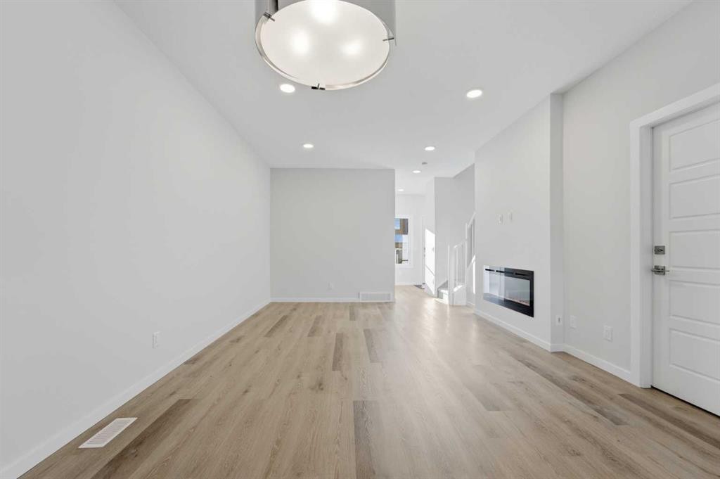 8 Heartwood Lane Se, Calgary, AB - Indoor Photo Showing Other Room