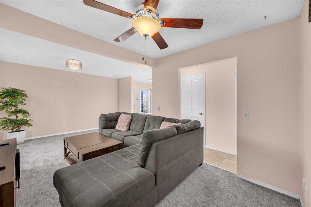 131 Coral Springs Circle Ne, Calgary, AB - Indoor Photo Showing Living Room