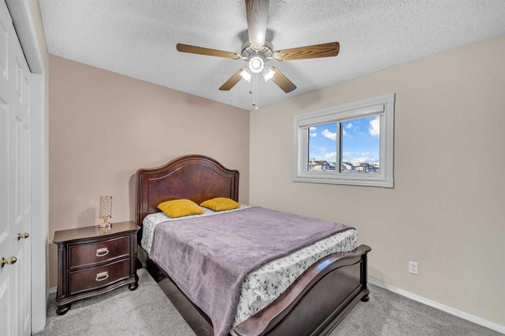 131 Coral Springs Circle Ne, Calgary, AB - Indoor Photo Showing Bedroom