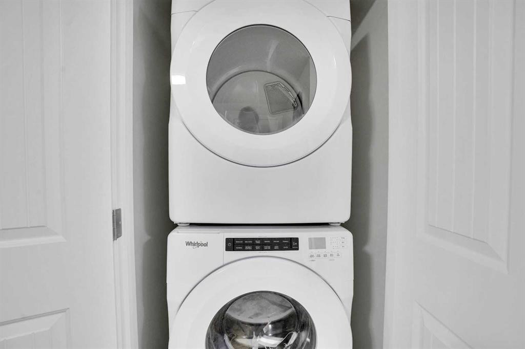 514 Wolf Willow Boulevard Se, Calgary, AB - Indoor Photo Showing Laundry Room