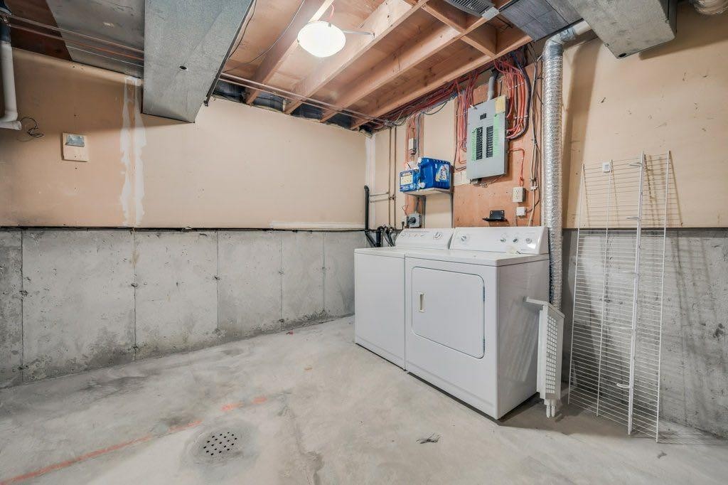 76 Glamis Gardens Sw, Calgary, AB - Indoor Photo Showing Laundry Room