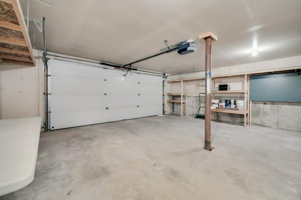 76 Glamis Gardens Sw, Calgary, AB - Indoor Photo Showing Garage