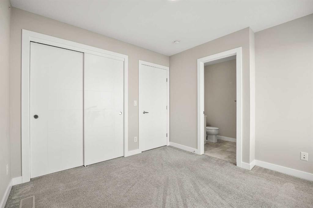 318 Evanscrest Square Nw, Calgary, AB - Indoor Photo Showing Other Room