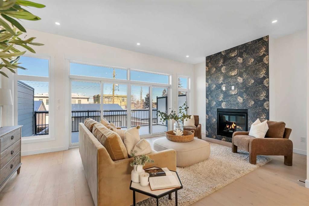 2436 30 Avenue Sw, Calgary, AB - Indoor Photo Showing Living Room With Fireplace