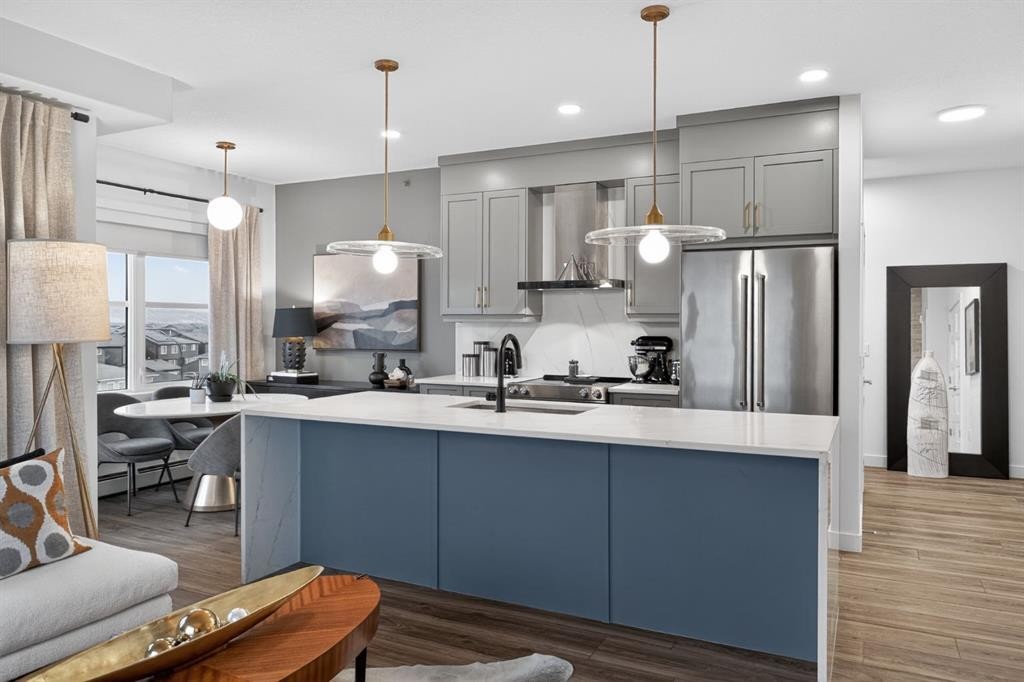 413-55 Wolf Hollow Crescent Se, Calgary, AB - Indoor Photo Showing Kitchen With Stainless Steel Kitchen With Upgraded Kitchen