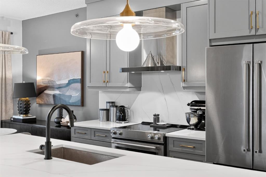 413-55 Wolf Hollow Crescent Se, Calgary, AB - Indoor Photo Showing Kitchen With Stainless Steel Kitchen With Upgraded Kitchen