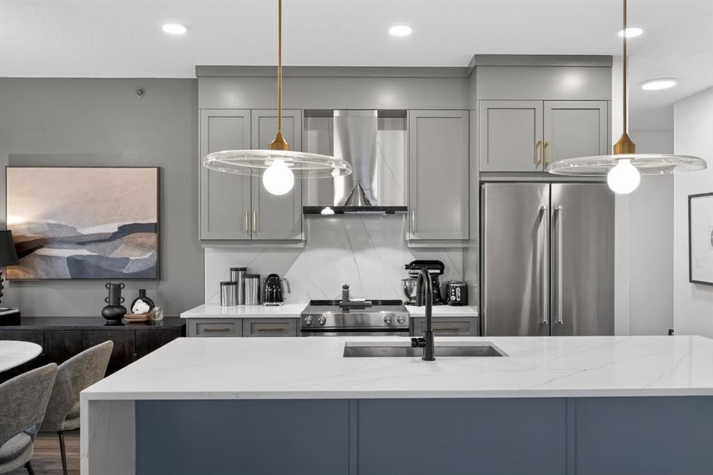 413-55 Wolf Hollow Crescent Se, Calgary, AB - Indoor Photo Showing Kitchen With Stainless Steel Kitchen With Upgraded Kitchen