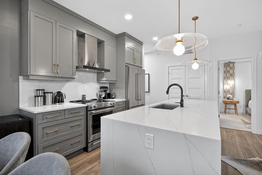 413-55 Wolf Hollow Crescent Se, Calgary, AB - Indoor Photo Showing Kitchen With Upgraded Kitchen