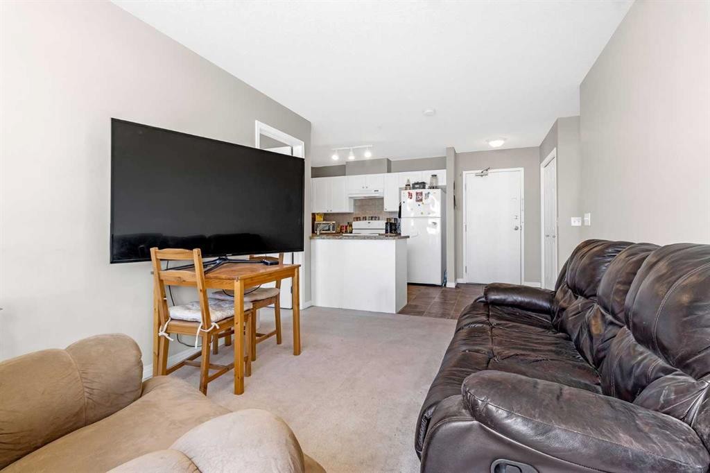207-1010 Railway Street, Crossfield, AB - Indoor Photo Showing Living Room